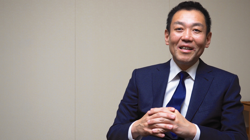 スマートコンストラクション推進本部⻑の四家千佳史⽒。「ICTは⽬的ではなくあくまで手段」と語る